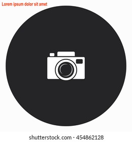 Camera web icon. Gray circle button with white illustration.