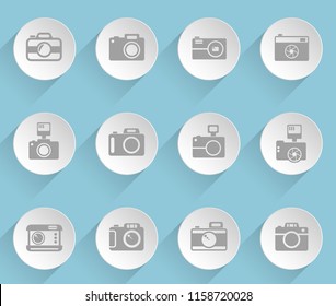 camera web icons on light paper circles