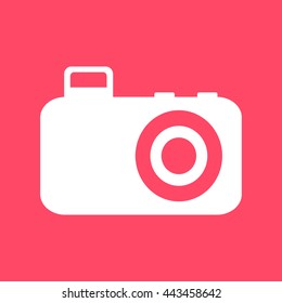  Camera white icon on magenta color background. Eps-10.