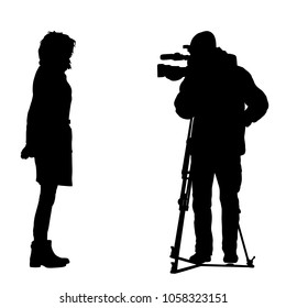 Cameraman with video camera. Silhouettes on white background