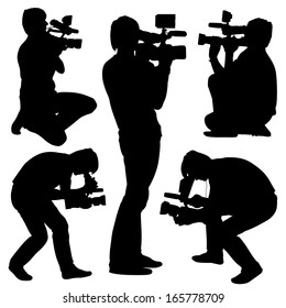 Cameraman with video camera. Silhouettes on white background. Vector illustration.