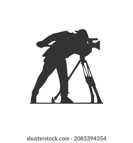 Cameraman with video camera. Silhouettes on white background. Vector illustration.