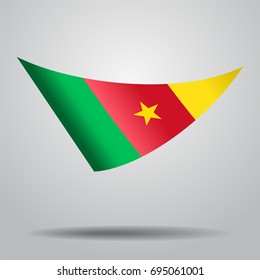 Cameroon flag wavy abstract background. Vector illustration.