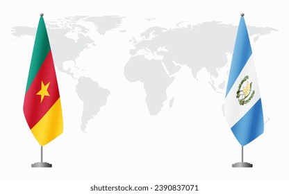 Cameroon and Guatemala flags for official meeting against background of world map.