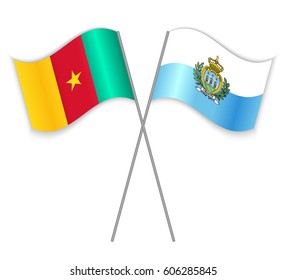 Cameroonian and Sammarinese crossed flags. Cameroon combined with San Marino isolated on white. Language learning, international business or travel concept.