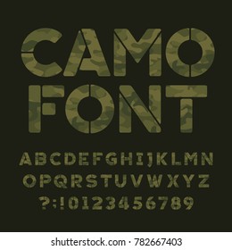 Camo alphabet font. Type letters and numbers on a dark green background. Vector typography for your design.