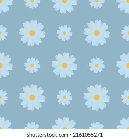 Camomiles. Delicate blue flowers. Repeating vector pattern. Isolated blue background. Seamless summer ornament. Delicate floral background. Flat style. Flowering plant. Idea for web design, packaging