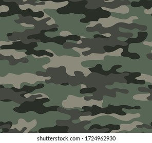 
Camouflage seamless forest military pattern on textiles. Vector illustration.