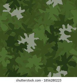 Camouflage seamless pattern background. Classic clothing style masking camo repeat print. Green and olive colors forest texture. Design element vector illustration.