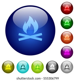 Camp fire icons on round color glass buttons