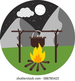 Camp fire at night in the forest