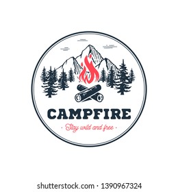 Camp logo with campfire. Stay wild and free. Vector illustration.