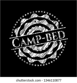 Camp-bed chalk emblem written on a blackboard