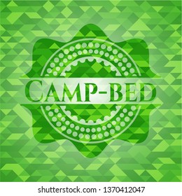 Camp-bed green emblem with triangle mosaic background