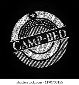 Camp-bed on chalkboard