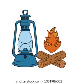 campfire camping and kerosene lantern