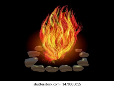 campfire in night in a circle of stones