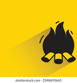 campfire with shadow on yellow background