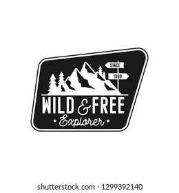 Camping Badge, adventure patch - wild and free explorer quote. Moutnain travel logo in monochrome style. Retro emblem. Stock vector hiking label isolated on white background.