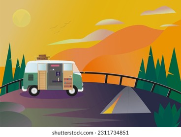 Camping car against the backdrop of a summer sunset landscape
