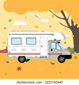 a camping car in a fall forest