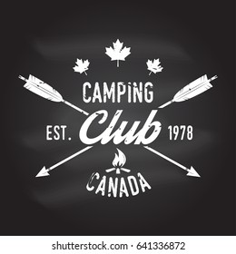 Camping club. Canada. Vector illustration on the chalkboard. Concept for shirt or logo, print, stamp or tee. Vintage typography design with campfire and arrows silhouette.