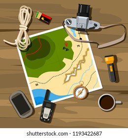 Camping equipment - map, vintage camera, compass 