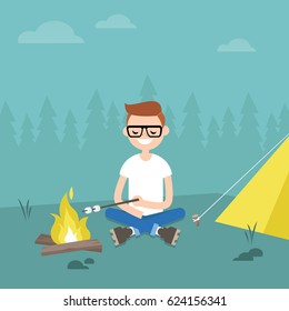 Camping in forest. Young character roasting marshmallows on fire / flat editable vector illustration, clip art