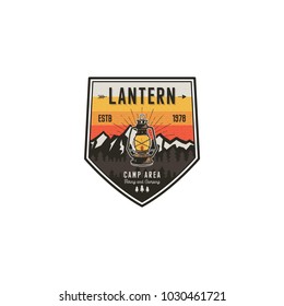 Camping and hiking vintage badge. Mountain explorer label. Outdoor adventure logo design with lantern. Travel and hipster vintage emblem. Wilderness camping patch. Stock vector