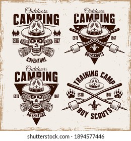 Camping set of four vector vintage emblems, badges, labels or logos with boy scout skull in hat, flashlights and marshmallow on sticks