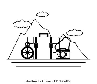 camping suitcase camera compass mountains