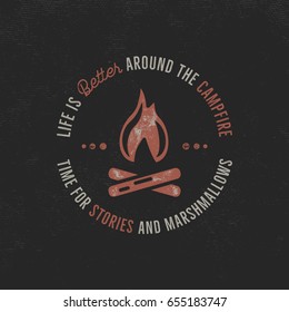 Camping t-shirt design. Hand drawn vintage label with typography quote text, textured campfire. Letterpress effect. Vector outdoors adventure illustration isolated on dark. Hipster logotype design