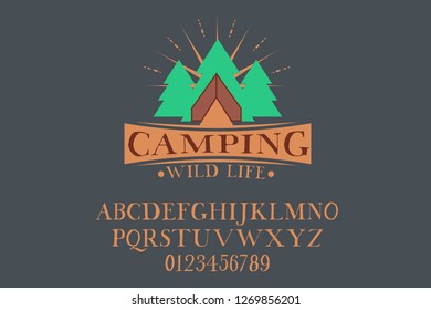 Camping Wild Life. Vector logo and alphabet font. North, original handmade logo. Serif font. Color. Authentic typeface.  Christmas style. 