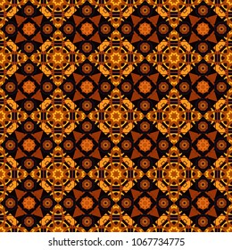 It can be used in the design of textiles, in the printing industry. Vector illustration. Kaleidoscopic seamless pattern in black, brown and orange colors.