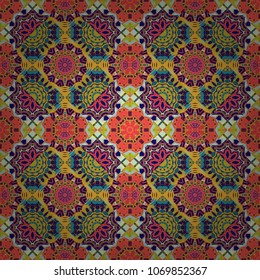 It can be used in the design of textiles, in the printing industry. Vector illustration. Kaleidoscopic seamless pattern in blue, orange and yellow colors.