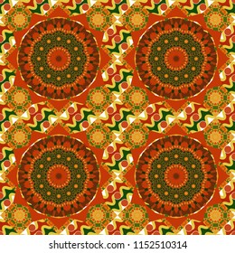 It can be used in the design of textiles, in the printing industry. Vector illustration. Kaleidoscopic seamless pattern in gray, orange and yellow colors.