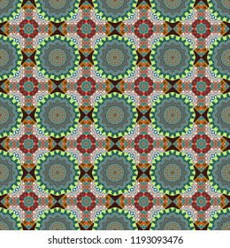 It can be used in the design of textiles, in the printing industry. Vector illustration. Kaleidoscopic seamless pattern in blue, green and brown colors.