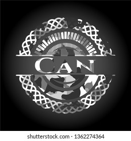 Can on grey camouflaged texture