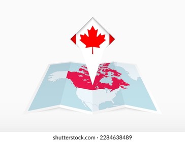 Canada is depicted on a folded paper map and pinned location marker with flag of Canada. Folded vector map.