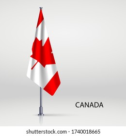 Canada hanging flag on flagpole