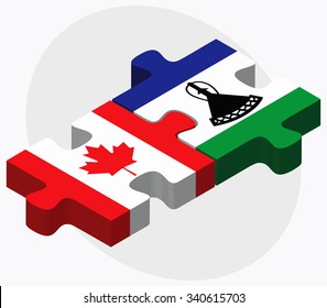 Canada and Lesotho Flags in puzzle isolated on white background