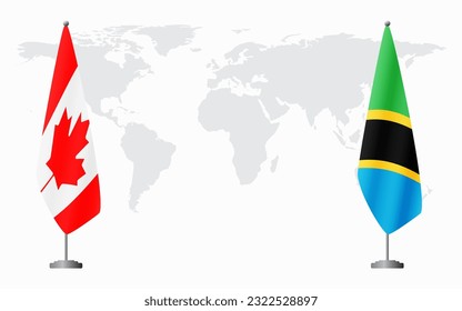 Canada and Tanzania flags for official meeting against background of world map.