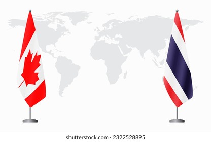 Canada and Thailand flags for official meeting against background of world map.