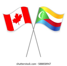 Canadian and Comoran crossed flags. Canada combined with Comoros isolated on white. Language learning, international business or travel concept.
