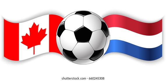 Canadian and Dutch wavy flags with football ball. Canada combined with Netherlands isolated on white. Football match or international sport competition concept.