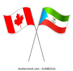 Canadian and Equatorial Guinean crossed flags. Canada combined with Equatorial Guinea isolated on white. Language learning, international business or travel concept.