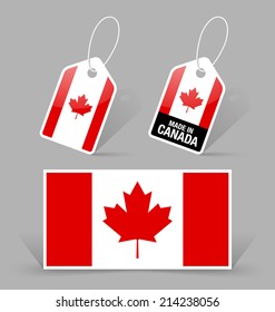 Canadian flag and sale tags on grey background