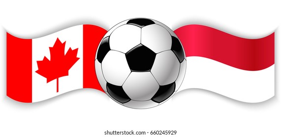 Canadian and Indonesian wavy flags with football ball. Canada combined with Indonesia isolated on white. Football match or international sport competition concept.