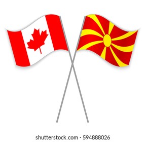 Canadian and Macedonian crossed flags. Canada combined with Macedonia isolated on white. Language learning, international business or travel concept.