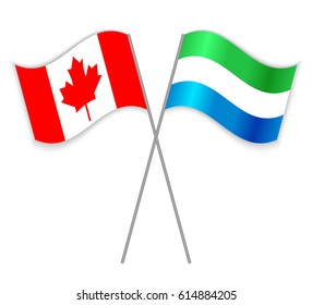 Canadian and Sierra Leonean crossed flags. Canada combined with Sierra Leone isolated on white. Language learning, international business or travel concept.